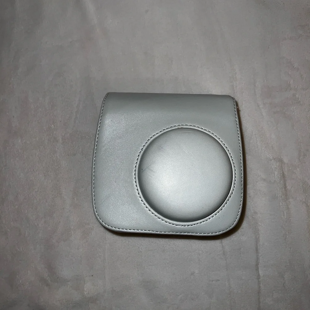 Instax Mini 9 case along with accessories